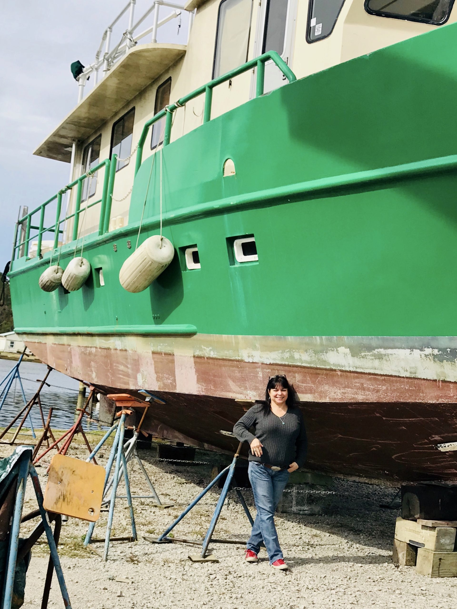Gari's standing in front of the boat